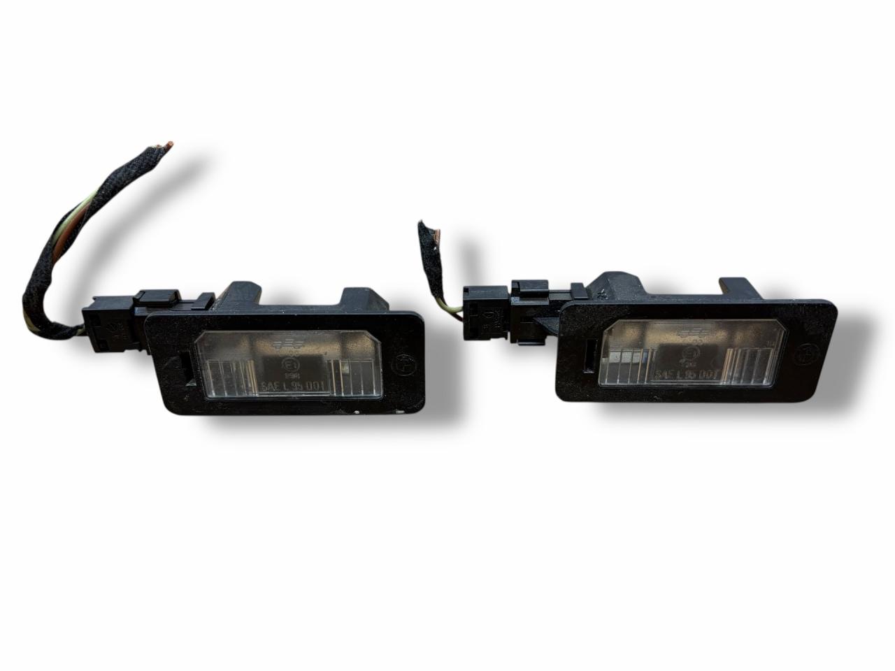 подсветка номера BMW 3 серия E90/E91/E92/E93 E90 2006, 2.0 л., i, N46 B20 A, бензин, 6МКПП, sparkling graphit / a22, седан, задний привод, правый руль, 7165646, 63267165646 - фото №1