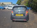 накладка двери (крышки) багажника Chevrolet Spark M300 2010, 1.2 л., i, B12D1, бензин, 5МКПП, carbon flash / gar, хетчбэк 5 дв., передний привод, правый руль, 95956286 - фото №11