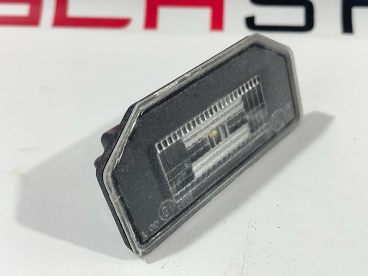 подсветка номера Tesla Model 3 1 поколение 2019, 1449730-00-B - фото №1