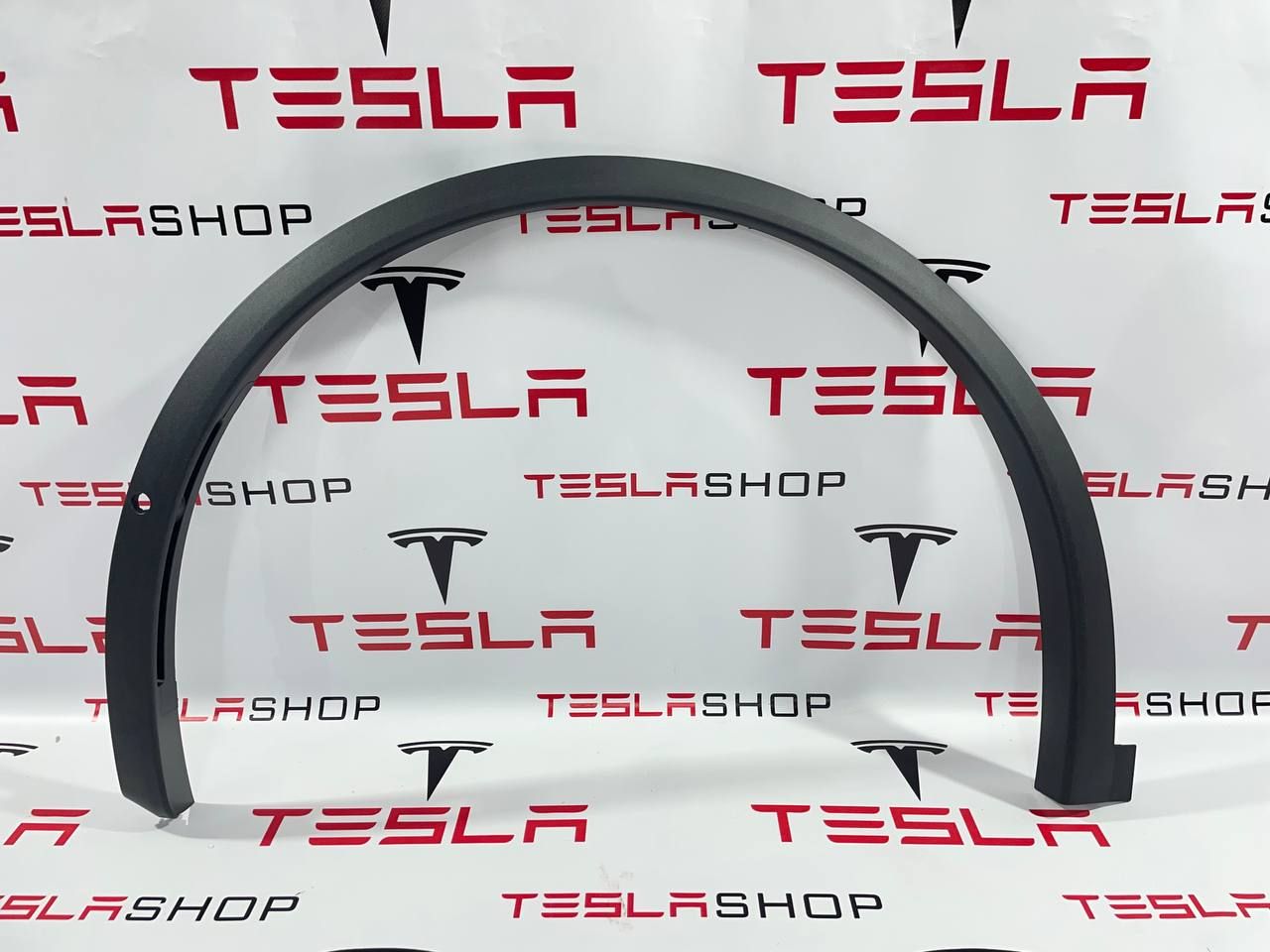 накладка колесной арки передний левый Tesla Model X 1 поколение 2019, 1078207-00-F, 1034429-00-K - фото №1