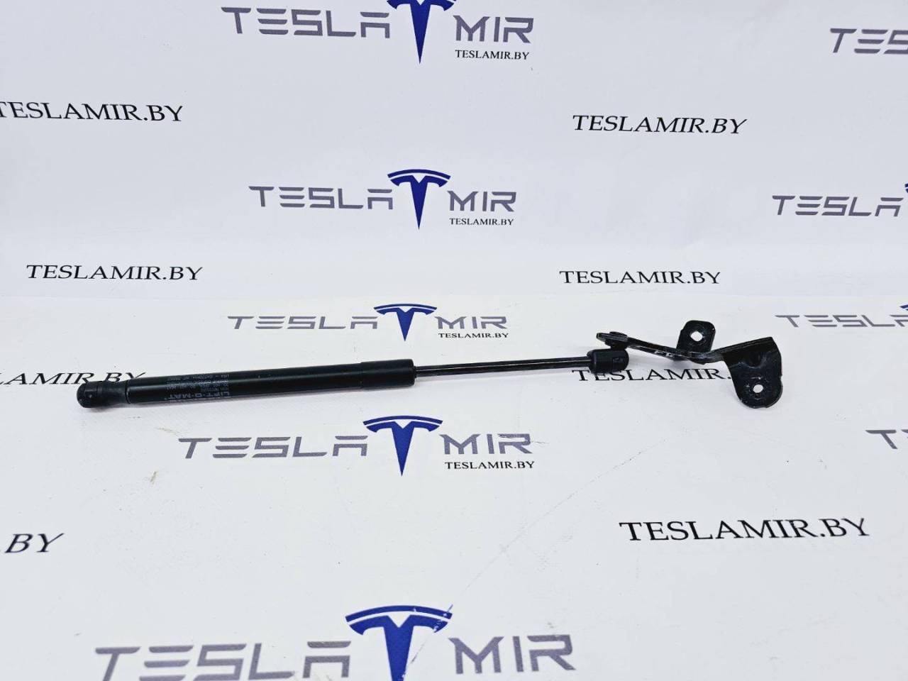 Амортизатор (упор) капота Tesla Model 3 1 поколение 2023, 1091870-00, 1089586-00, 1091472-00 - фото №1