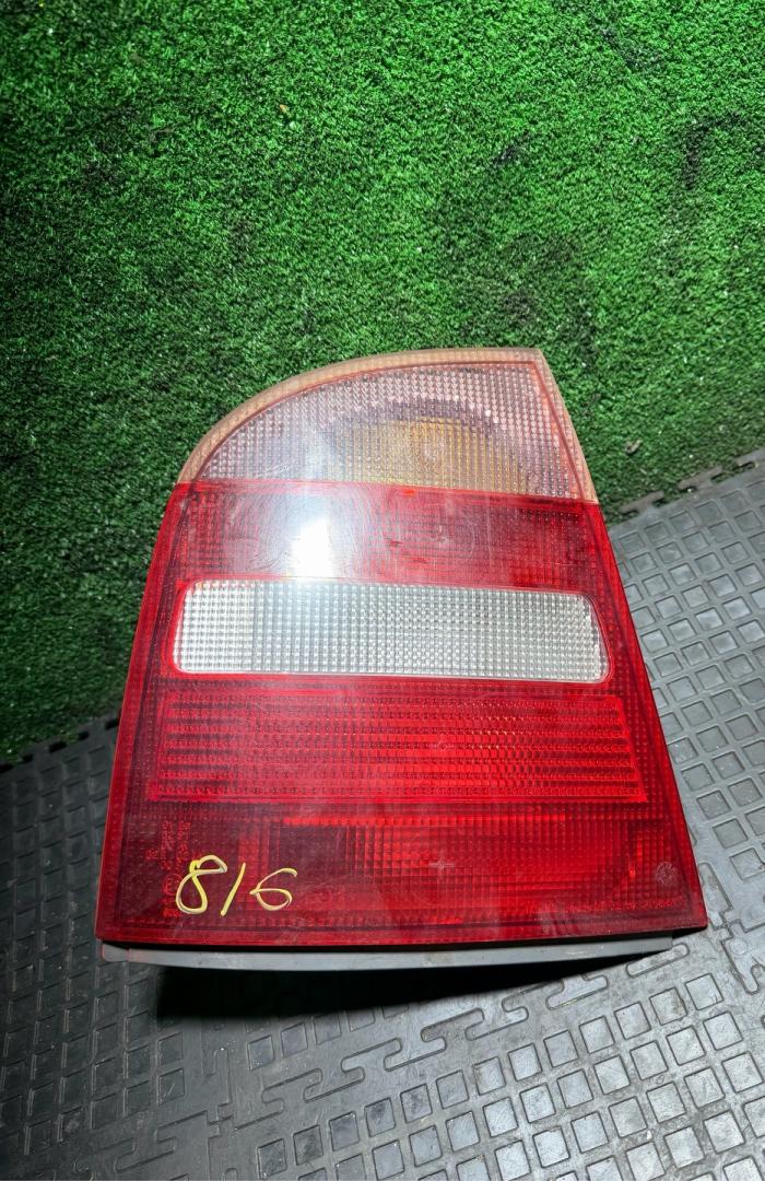 фонарь задний левый Skoda Octavia 1 поколение (A4) 1997, 1.6 л., бензин, лифтбэк, 1U6945095 - фото №1