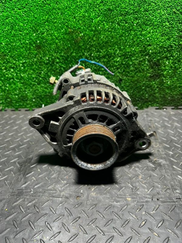 генератор Nissan Almera N16 2003, 1.8 л., 23100BU015 - фото №1