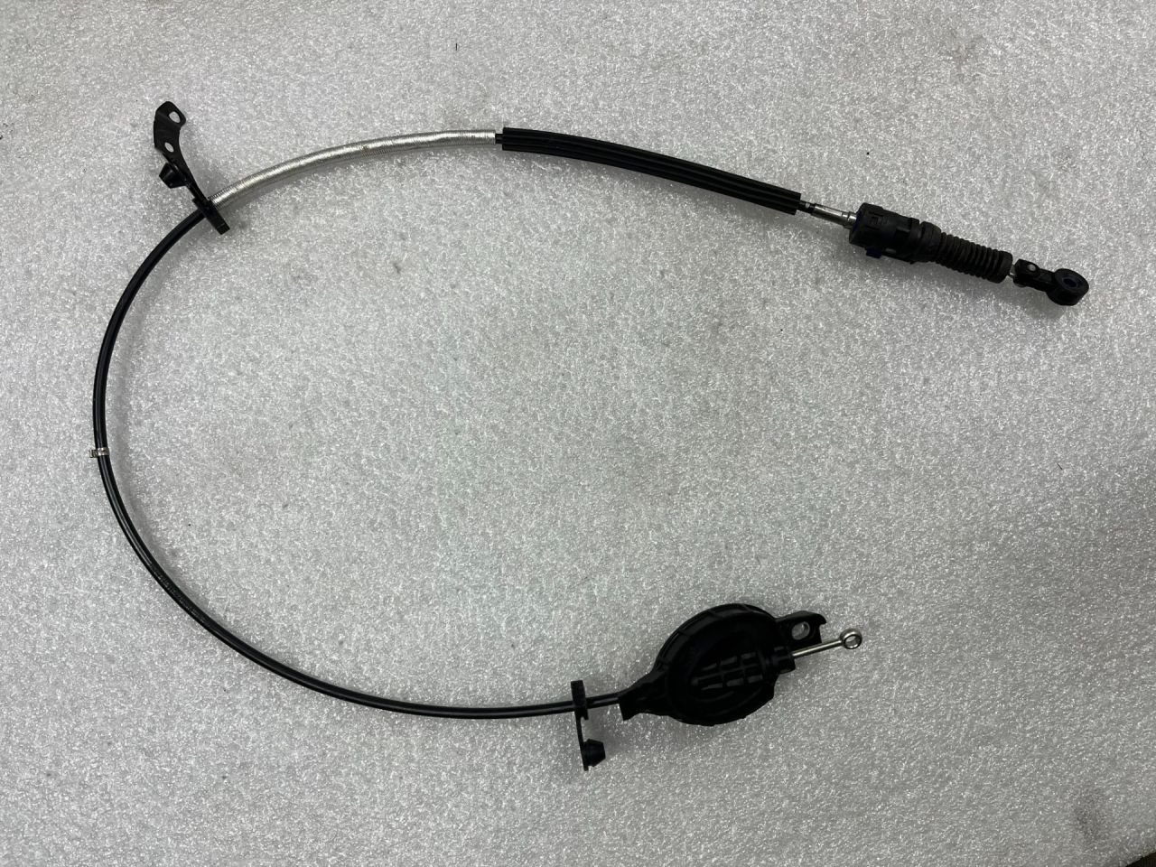 трос кулисы КПП Mini Countryman 2 поколение F60 2017, 1.5 л., B36 A15 A, бензин, АКПП, c2m, хетчбэк 5 дв., передний привод, 25168666168, 8666168, 25168483100, 8483100 - фото №1