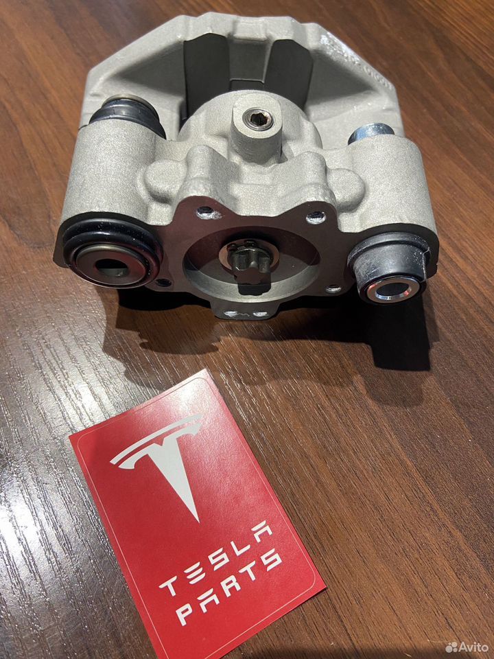 Новый Суппорт стояночный Tesla model S X Tesla Model S 1 поколение (2012 - 2016), хетчбэк 5 дв., 1021250-00-F - фото №1