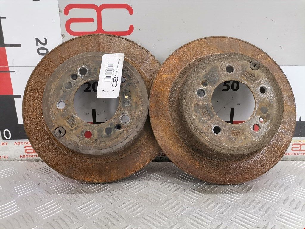 диск тормозной задний Kia Optima 3 поколение 2012, 2.4 л., АКПП, седан, 584113Q000 - фото №1