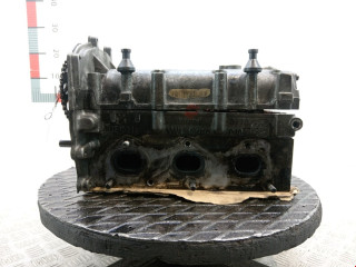 головка блока цилиндров Volkswagen Polo 4 поколение 2003, 1.2 л., МКПП, хетчбэк 5 дв., 03E103373C