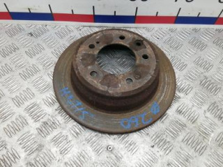 диск тормозной задний Kia Sportage 3 поколение 2012, 1.7 л., CRDi, дизель, МКПП, внедорожник 5 дв., 584111H100