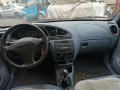 суппорт передний левый Mazda 121 2 поколение 1996, 1.3 л., МКПП, хетчбэк 5 дв., 1E0333990B - фото №13