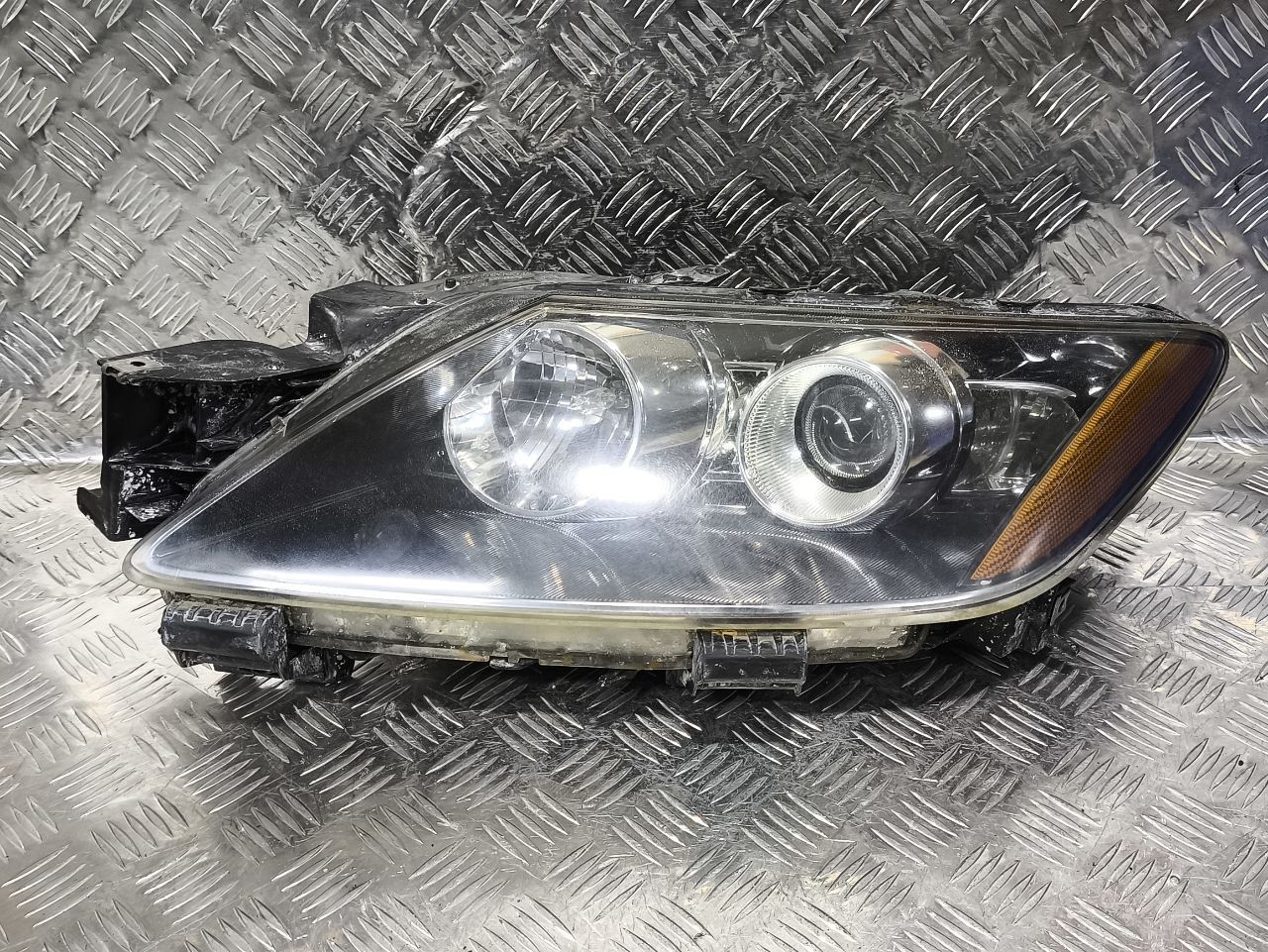 фара левая Mazda CX-7 1 поколение (2006 - 2009), правый руль, EG21510K0E - фото №1