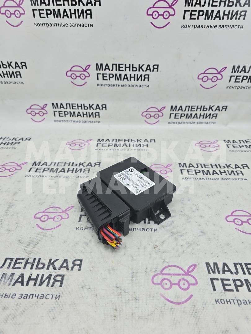 блок управления ручником BMW 6 серия F06/F12/F13 2012, 4.4 л., N63 B44 B, бензин, АКПП, alpinweiss 3 (300), хетчбэк 5 дв., задний привод, правый руль, 6863800, 34436863277, 6858017, 34436887358, 6887358, 34436858017, 34436862808, 6862808, 34436863800, 6863277 - фото №1