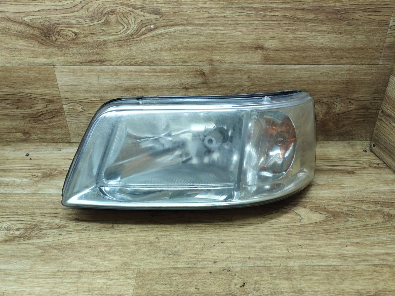 фара левая Volkswagen Transporter T5 2004, 1.9 л., AXC, дизель, МКПП, микроавтобус, 0301191301, 7H1941015N - фото №1