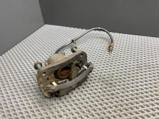 суппорт передний левый Toyota Cami 1 поколение J122E 2001, 1.3 л., K3-VE, бензин, АКПП, 6a5 - черный, внедорожник 5 дв., задний привод, правый руль, 47750-87401