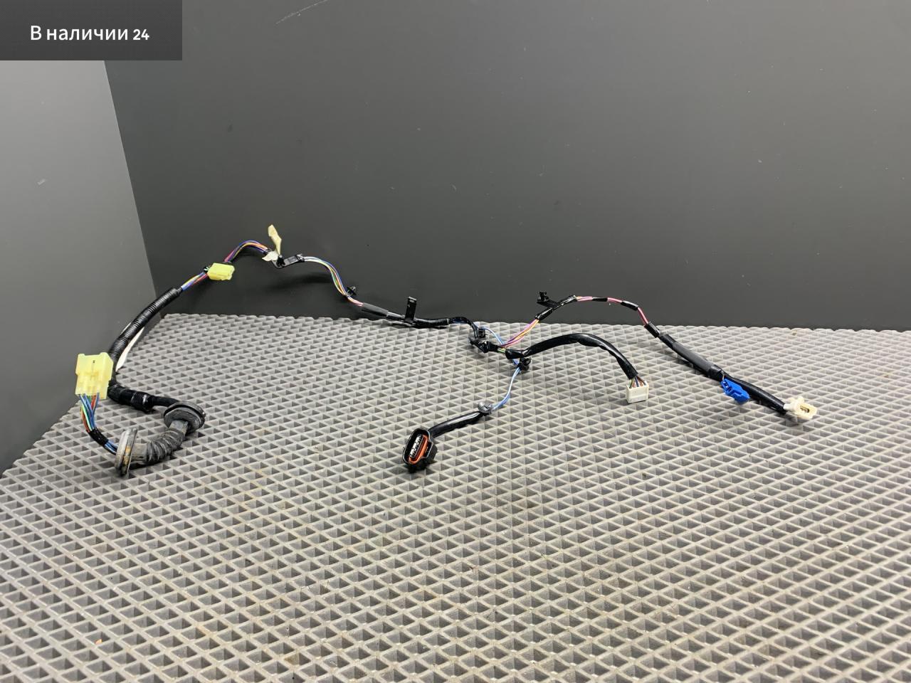 дверная проводка Toyota Cami 1 поколение J122E 2001, 1.3 л., K3-VE, бензин, АКПП, 6a5 - черный, внедорожник 5 дв., задний привод, правый руль, 82152-87418 - фото №1