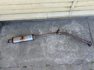 глушитель Kia Rio 2 поколение [рестайлинг] JB 2009, 1.4 л., G4EE, бензин, МКПП, белый ud - clear white, седан, передний привод, 287001G310