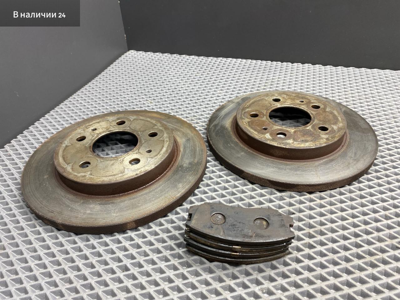 диски тормозные (комплект) Toyota Cami 1 поколение J122E 2001, 1.3 л., K3-VE, бензин, АКПП, 6a5 - черный, внедорожник 5 дв., задний привод, правый руль, 43512-87402, 04491-87401 - фото №1