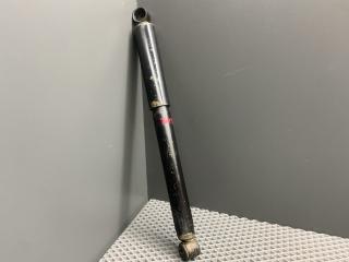 амортизатор задний левый Toyota Cami 1 поколение J122E 2001, 1.3 л., K3-VE, бензин, АКПП, 6a5 - черный, внедорожник 5 дв., задний привод, правый руль, 48530-87407, D7011