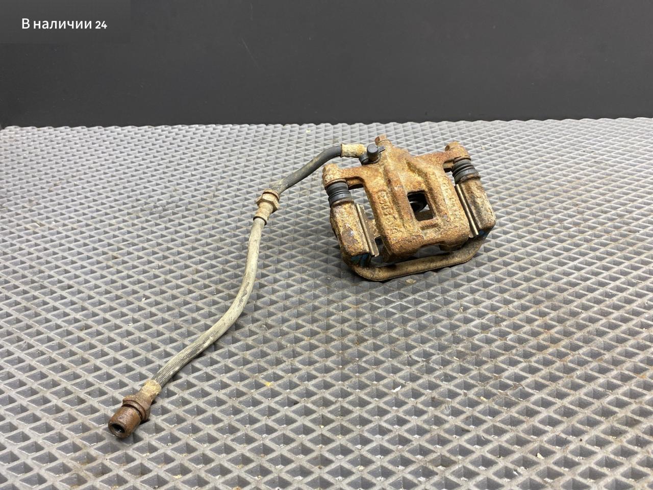 суппорт задний левый Chevrolet Lacetti 1 поколение J200 2012, 1.6 л., F16D3, бензин, МКПП, хетчбэк 5 дв., передний привод, правый руль, 96800085 - фото №1