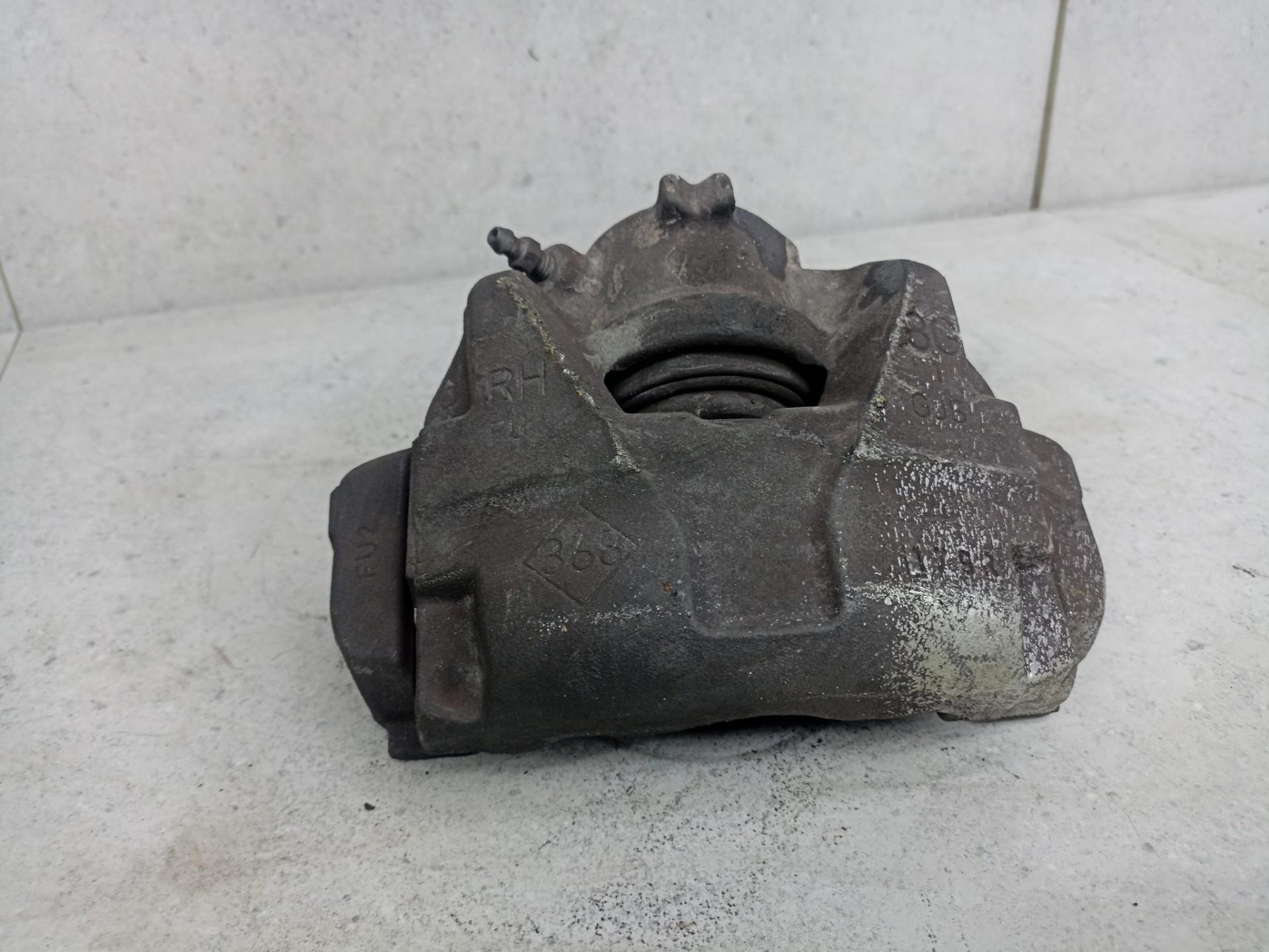 Суппорт передний правый Renault duster 1 2.0