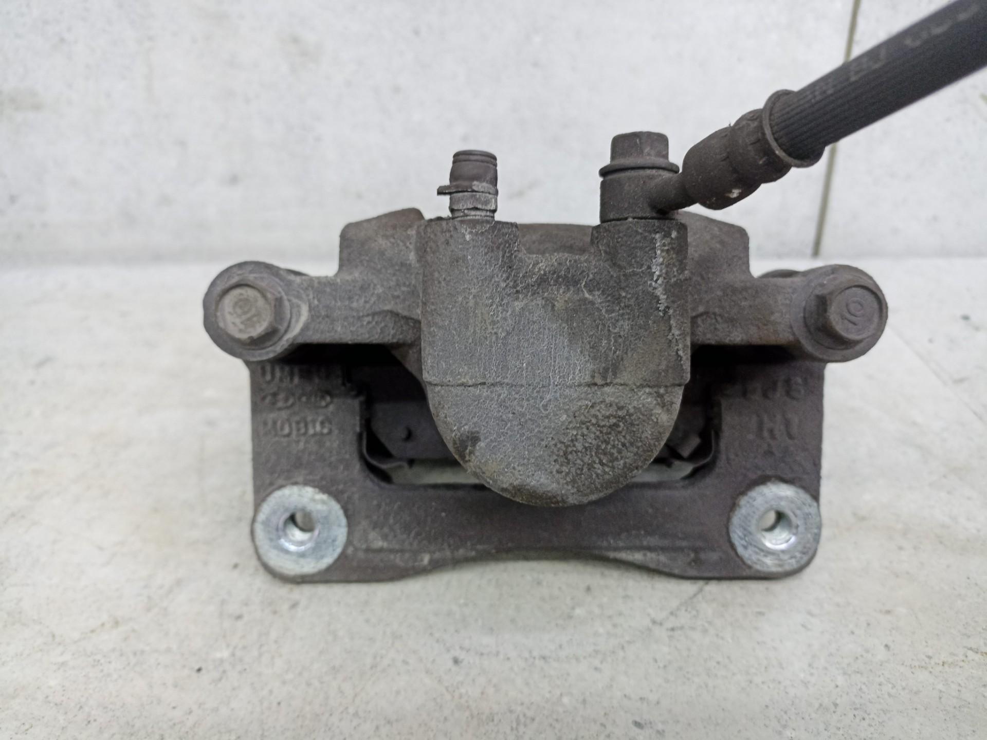 Суппорт тормозной задний правый Kia Sorento 3 prime