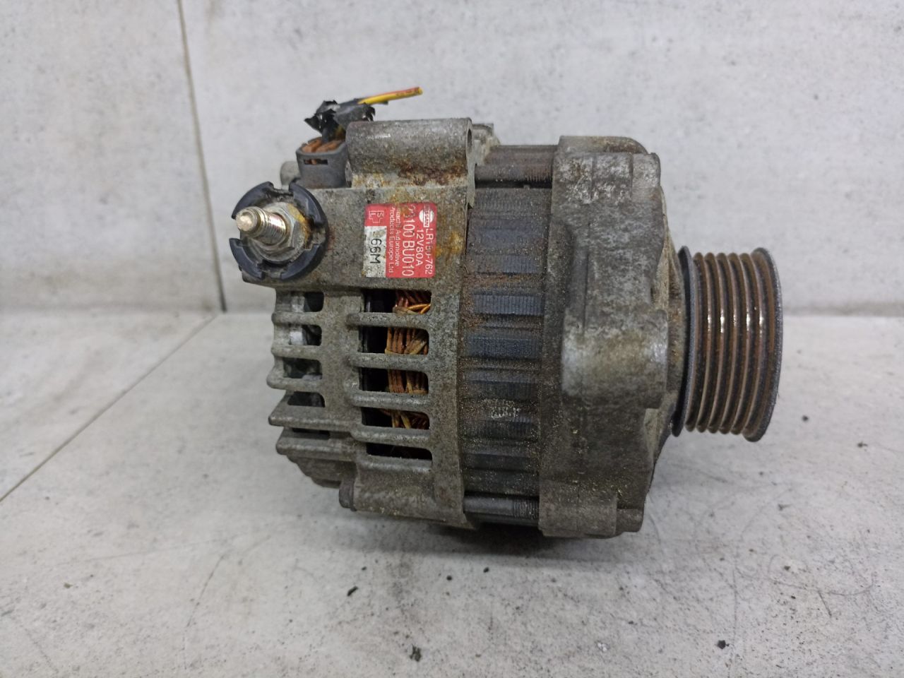 генератор Nissan Primera P12 2005, 23100BU010 - фото №1