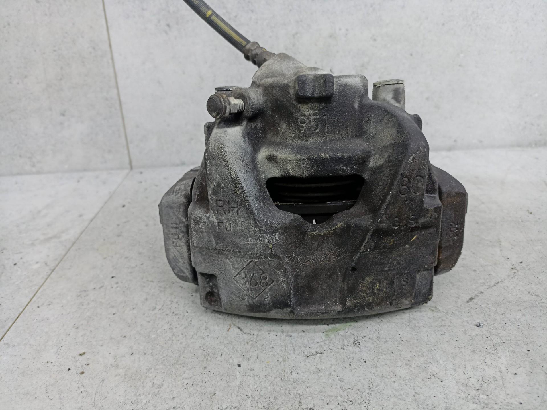 Суппорт тормозной передний правый Рено Дастер 1