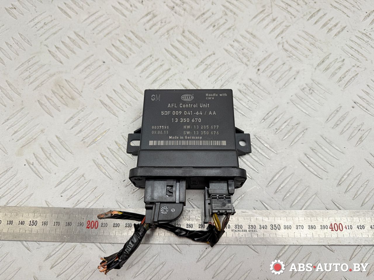 блок управления светом Opel Insignia 1 поколение (A) 2011, 2.0 л., A 20 DTH, дизель, МКПП, седан, 13350670, 5DF00904164 - фото №1