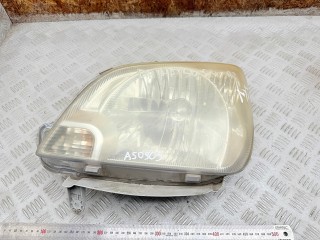 фара левая Daihatsu Cuore L250 2005, 10051731