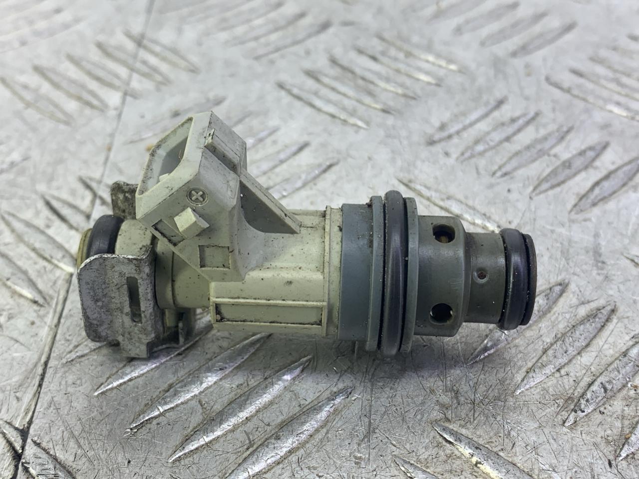форсунка Opel Astra G 1999, 1.2 л., X 12 XE, бензин, МКПП, зеленый, универсал, задний привод, 0280155793 - фото №1