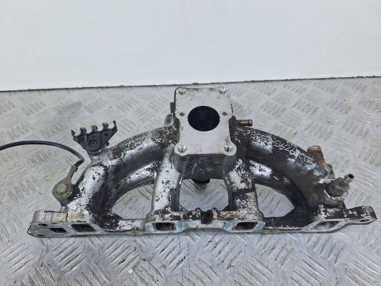 коллектор впускной Ford Fiesta 3 поколение (1989 - 1996), 1.1 л., G6A, бензин, МКПП, хетчбэк 3 дв., передний привод, 89BF9424CG - фото №1