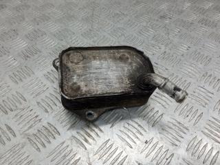 теплообменник масляного фильтра Audi A4 B6 2002, 2.0 л., 06B117021