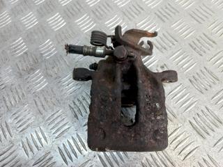 суппорт задний левый Volvo V40 1 поколение 1999