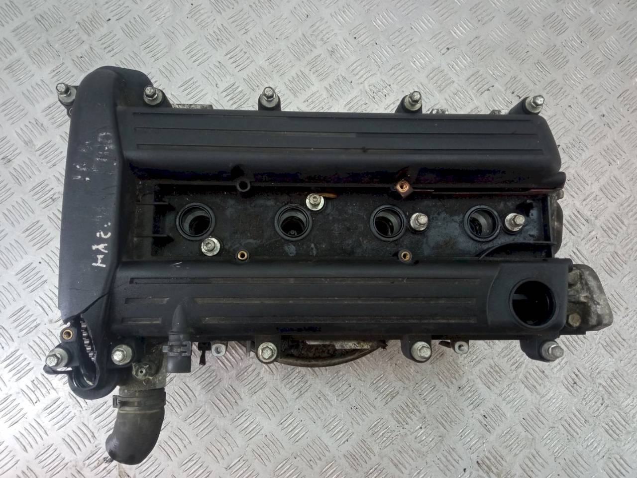 головка блока цилиндров Opel Zafira 2 поколение (B) 2007, 2.2 л., i, 55561003 - фото №1
