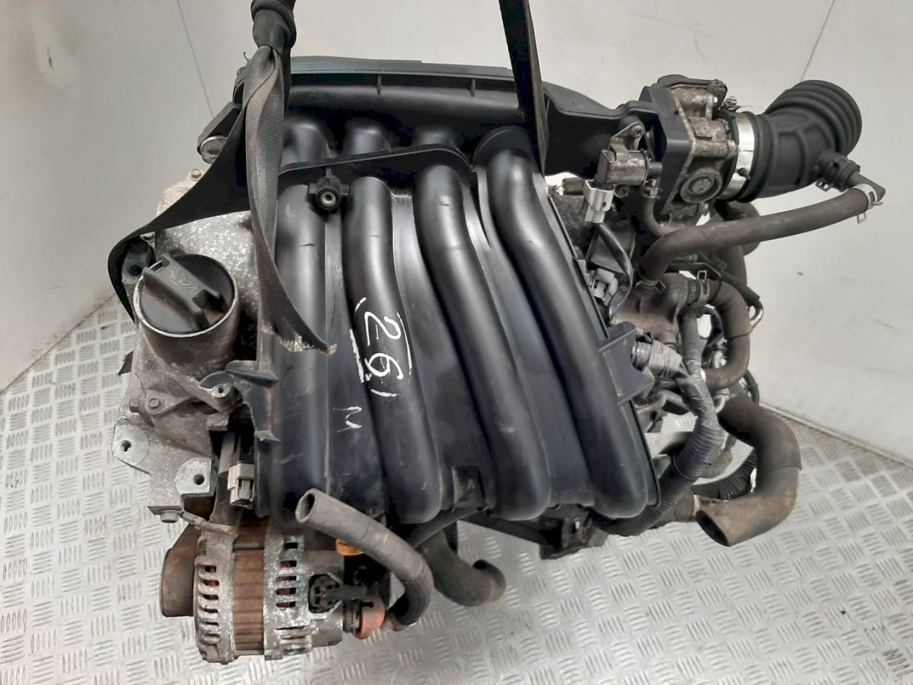 двигатель Nissan Qashqai 1 поколение 2009, 1.6 л., i, бензин, 387337A - фото №1