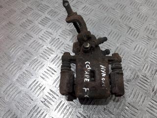 суппорт задний левый Hyundai Coupe GK F/L [рестайлинг] 2005