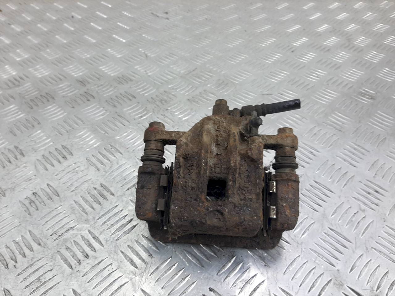 суппорт задний левый Hyundai Tucson 1 поколение 2005 - фото №1