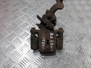 суппорт задний правый Hyundai Coupe GK F/L [рестайлинг] 2005