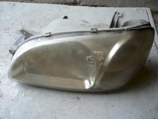 фара левая Kia Carnival UP/GQ [рестайлинг] 2001