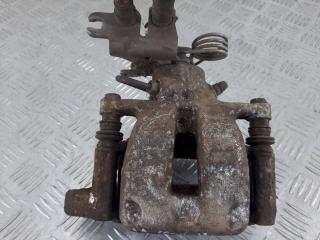 суппорт задний левый Volkswagen Caddy 3 поколение 2010