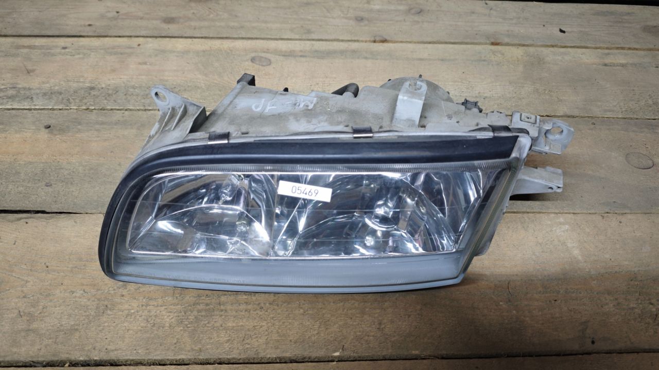 фара левая Mazda Millenia 1 поколение 1998 - фото №1