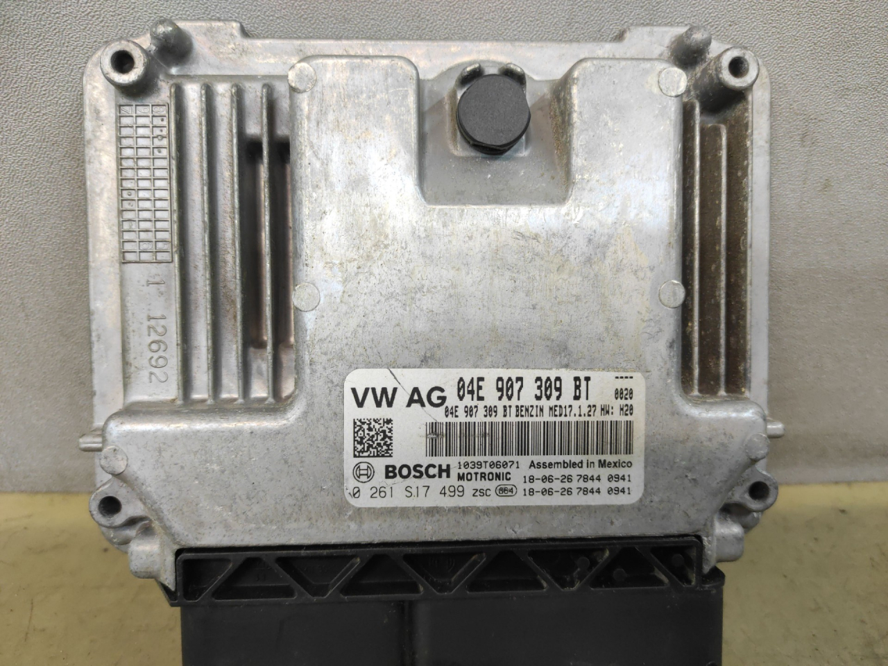 блок управления двигателем Volkswagen Jetta 7 поколение 2019, 1.4 л., бензин, АКПП, синий, седан, передний привод, 04E907309BT - фото №1