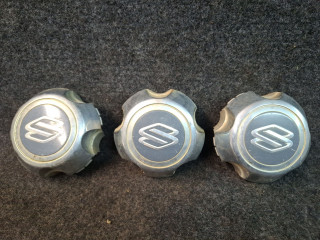 колпачок литого диска Suzuki Grand Vitara 1 поколение [рестайлинг] 2005, 2.7 л., H 27 A, бензин, АКПП, внедорожник 5 дв.