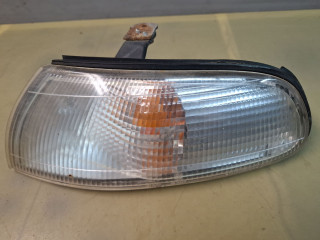 поворотник левый Mazda 626 GE [рестайлинг] GE 1995, 1.8 л., FP, бензин, МКПП, хетчбэк 3 дв., 21061612