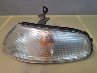 поворотник левый Mazda 626 GE [рестайлинг] GE 1995, 1.8 л., FP, бензин, МКПП, хетчбэк 3 дв., 21061612