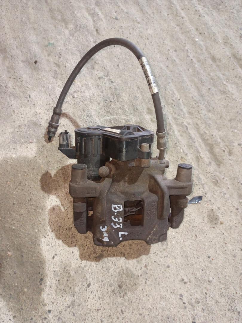 суппорт задний левый Ford Escape 4 поколение CX482 2020, 1.6 л., LUB, бензин, АКПП, белый az, внедорожник 5 дв., полный привод - фото №1