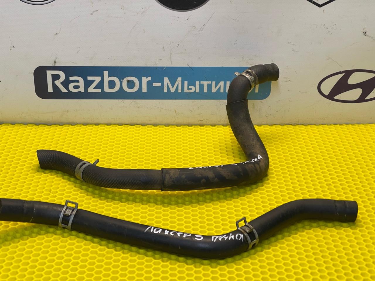 патрубок отопителя (печки) Mitsubishi Lancer 9 поколение 2004, 1.6 л., 4G18, бензин, АКПП, пурпурный, седан, передний привод, MN150638 - фото №1