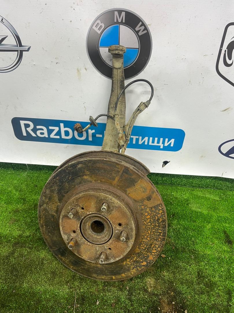 кулак поворотный правый Honda Odyssey 1 поколение RA4 1999, 2.3 л., F23A, бензин, АКПП, синий, полный привод, правый руль - фото №1