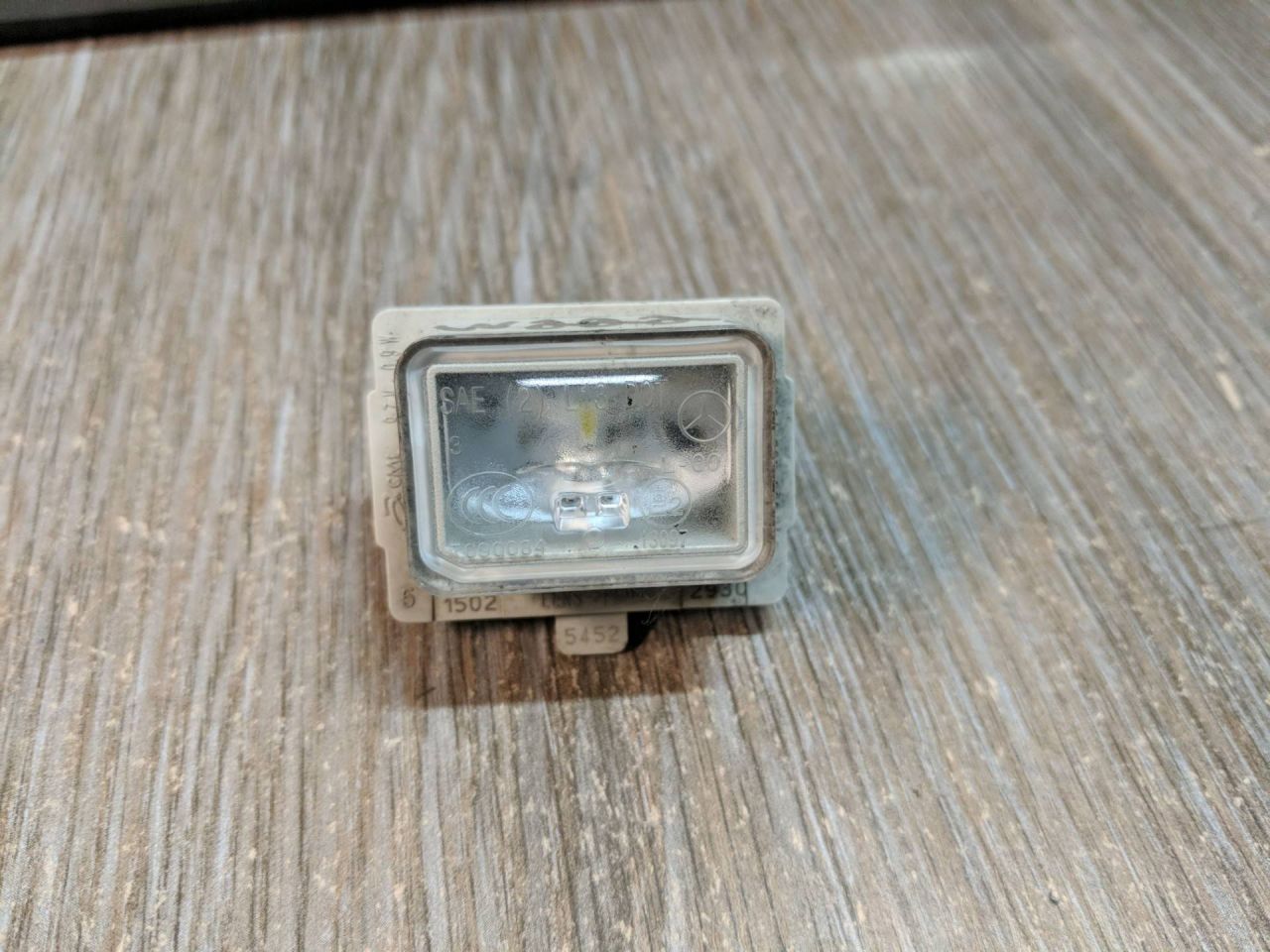 подсветка номера Mercedes-Benz S-Класс W222/C217/A217 2014, 3.0 л., OM 642.861, дизель, АКПП, серебристый, седан, A0999067000 - фото №1