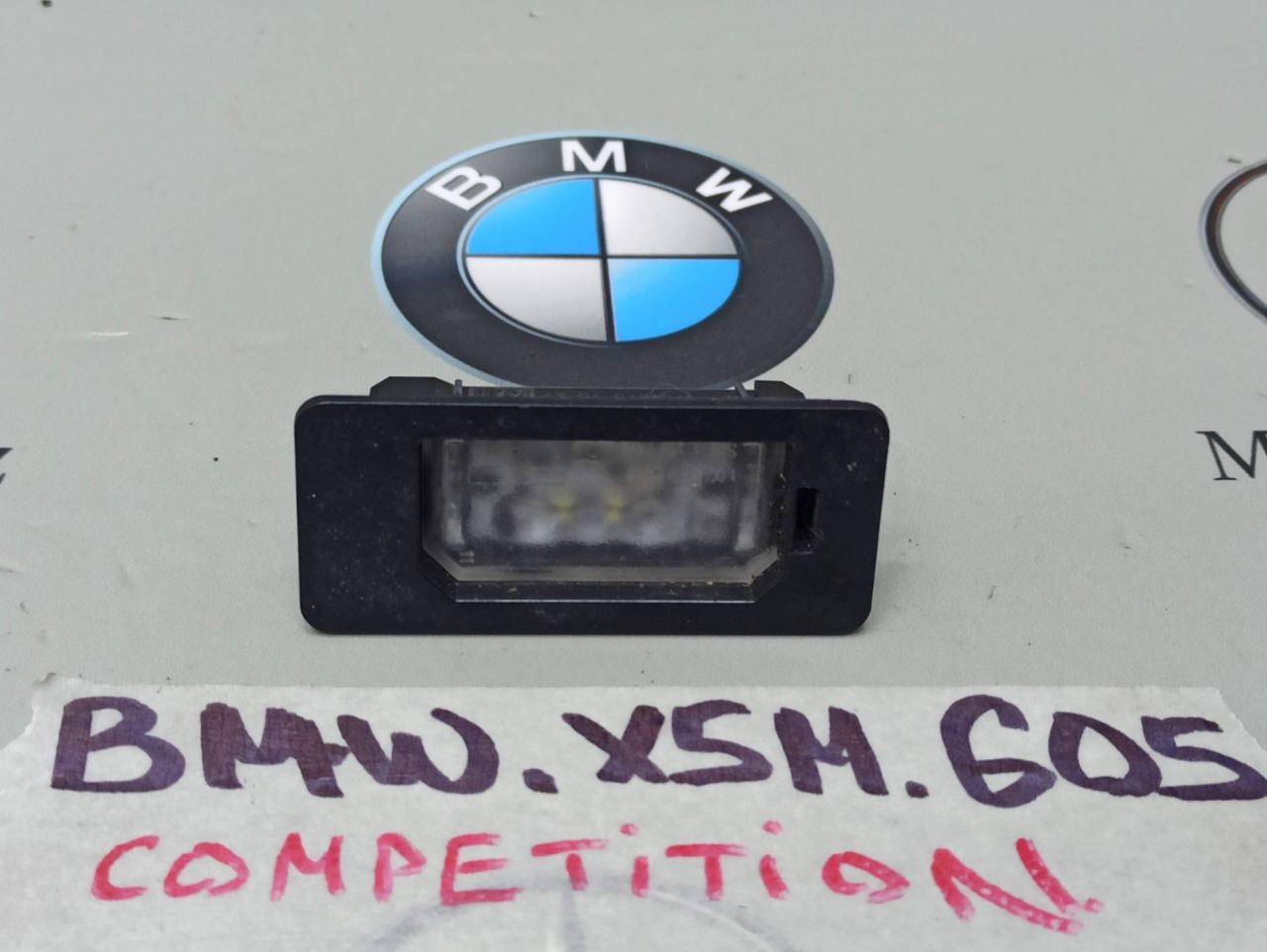 подсветка номера BMW X5 M F95 2021, 4.4 л., бензин, полный привод, 9481841 - фото №1