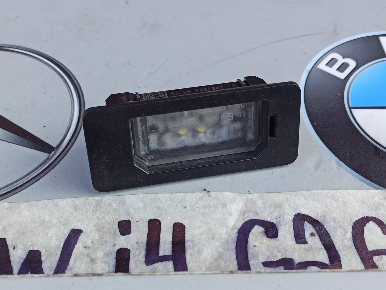 подсветка номера BMW i4 G26 2022, электро, АКПП, 9481841 - фото №1